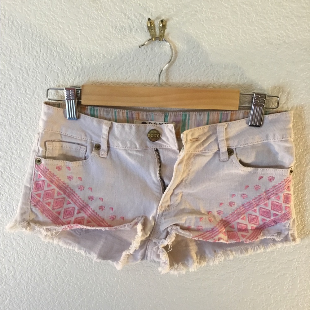 Roxy shorts with pink stitched tribal detail